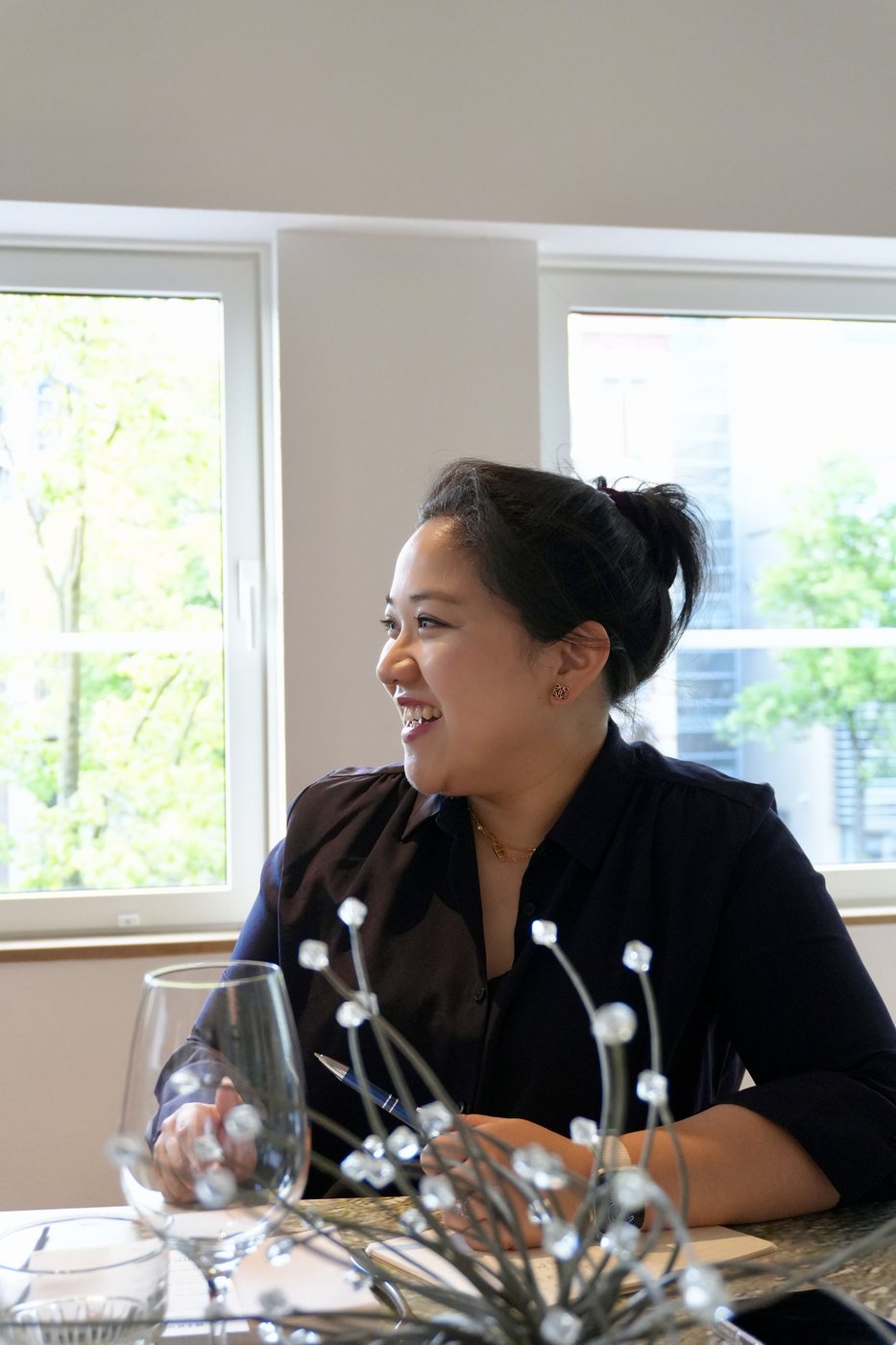 A guest laughing at the table