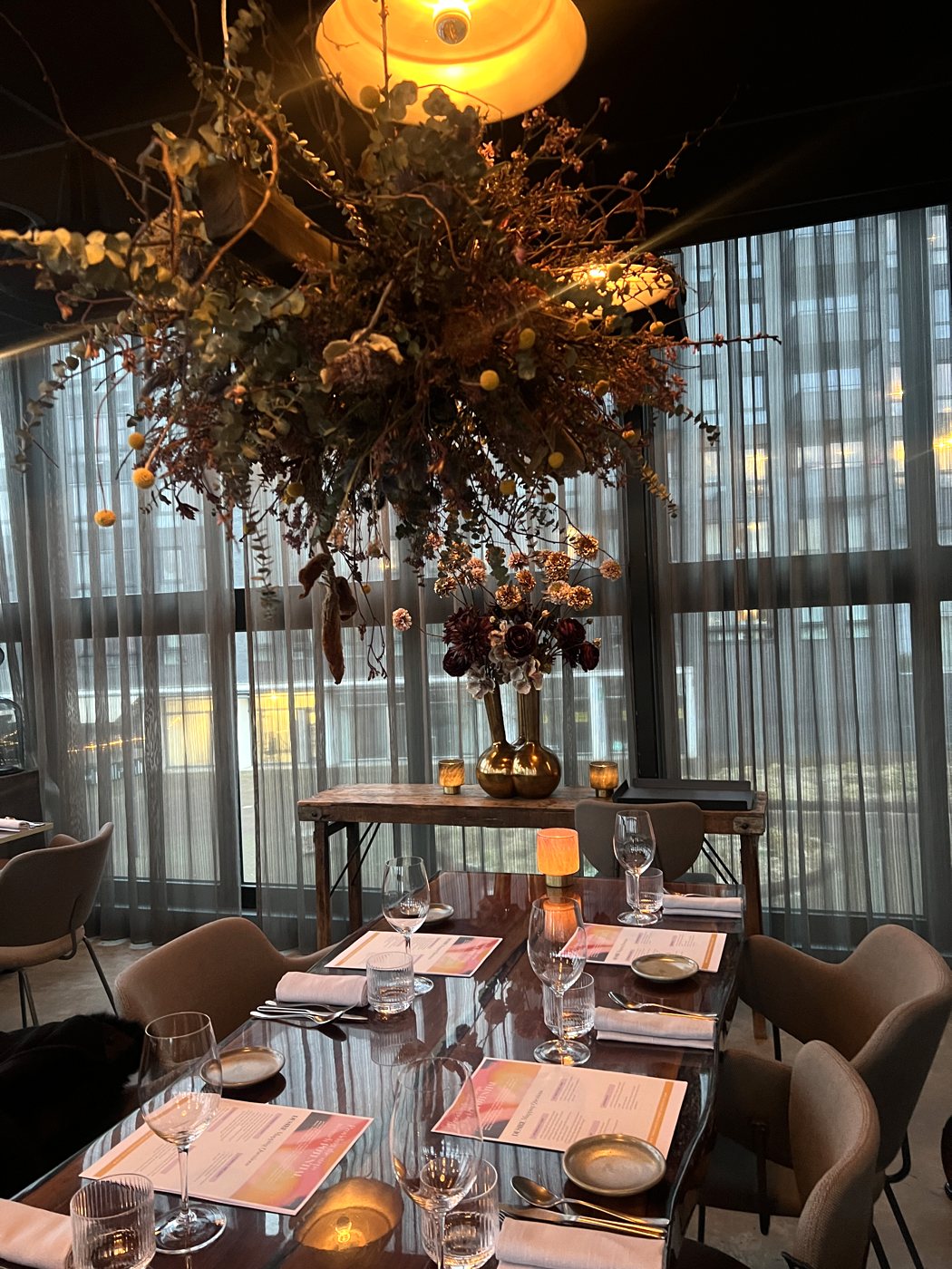 The table under the dried flowers at Wolf Atelier