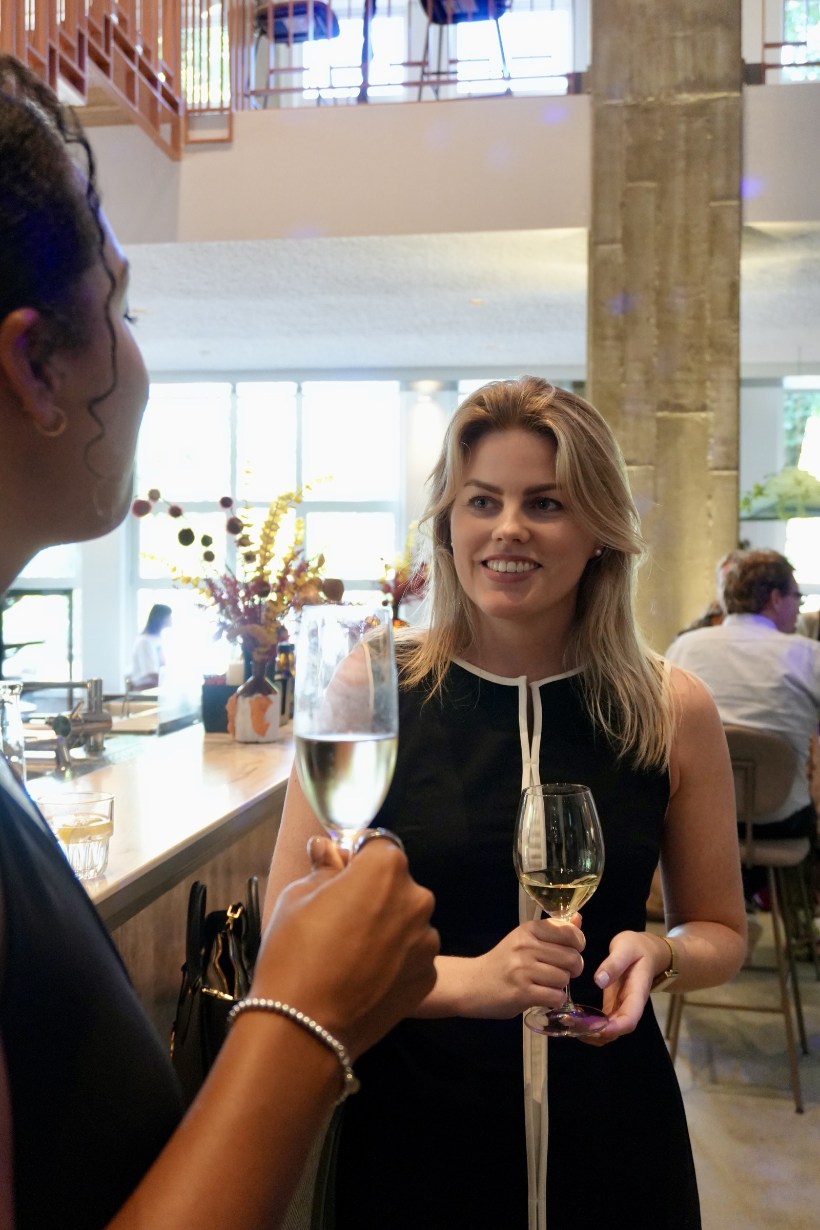 Guests with champagne at an Aureum evening